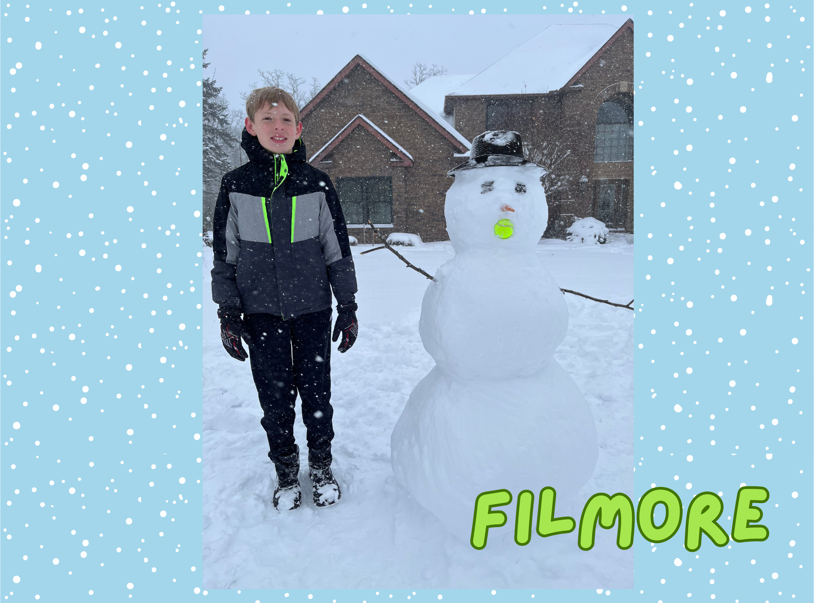 young boy with a snowman that has a tennis ball mouth
