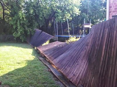 fence falling down on property